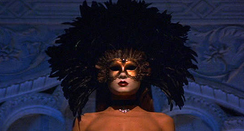 24\\At the very center of EWS is a ball attended by elites and scantily-clad beautiful women wearing Venetian masks.