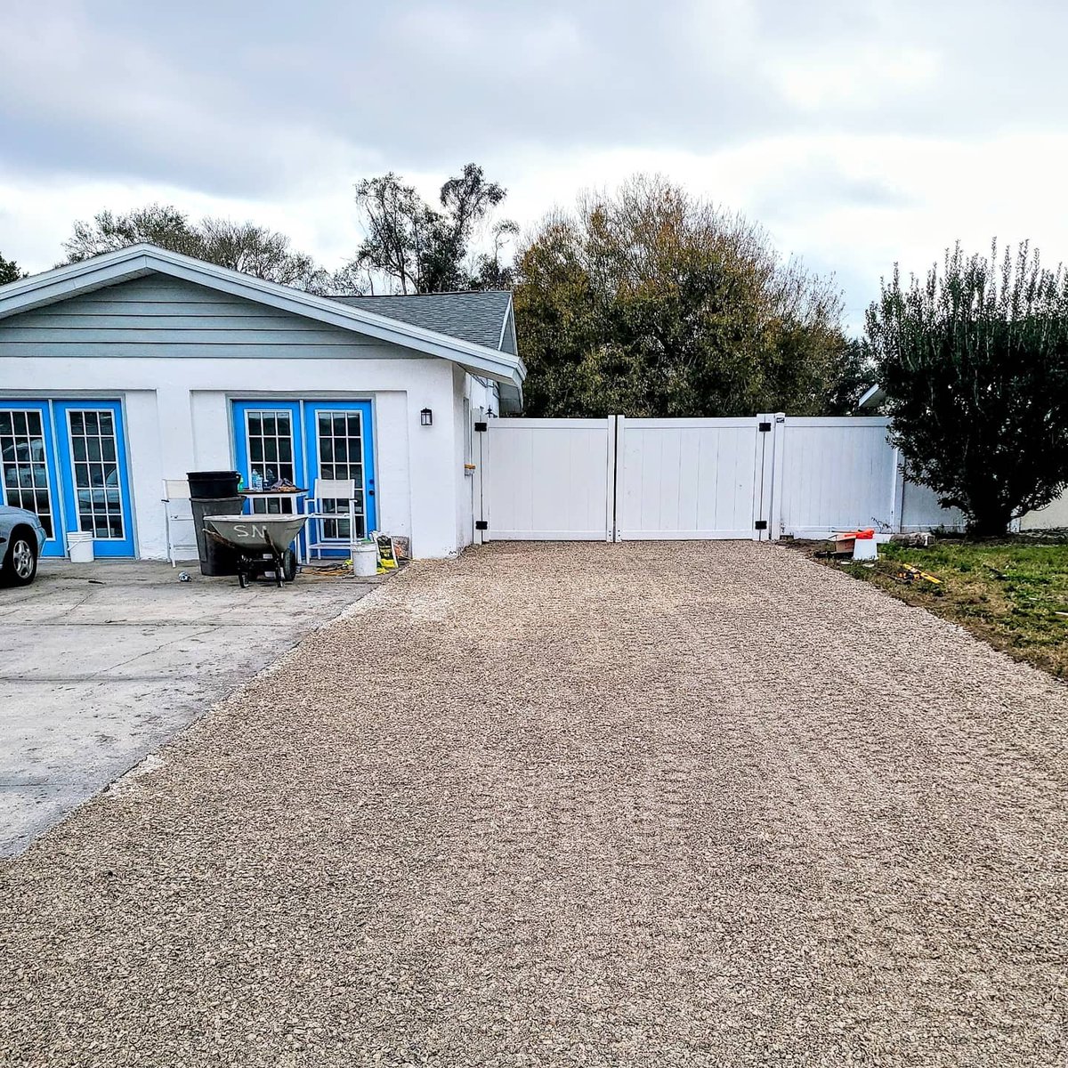 Graded the ground to put sea shells in and make sure the gate swings open properly.  #skidsteer #Sarasota #sarasotasmallbusiness #landscapemaintenance #landscaping