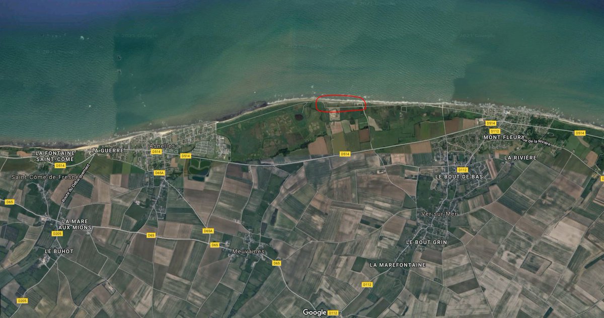 It's here on Gold Jig Red Beach. The location of the craters is in green, and in the bottom right of the image is a portion of strongpoint WN-35, shown in blue. The right side of the photo is actually the boundary between Jig and King beaches. Google