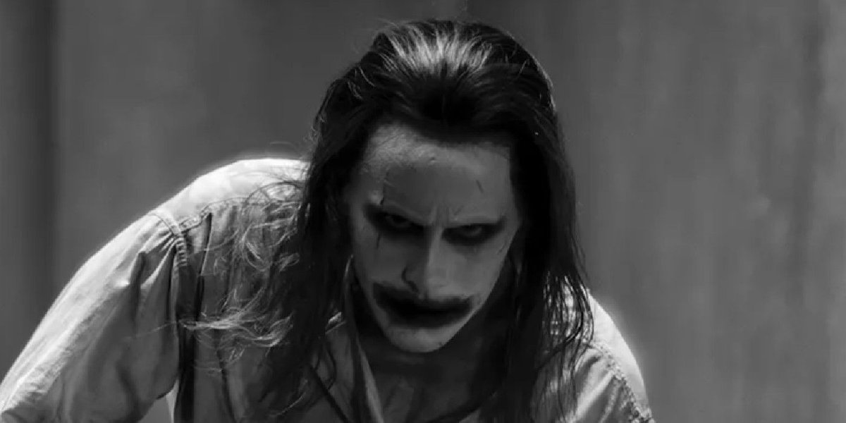 screenrant's tweet photo. BREAKING: Jared Leto's redesigned Joker in the Snyder Cut has been revealed!

Check out the images: https://t.co/r8VjaoMLh7 https://t.co/Xqo5Gtbyvi