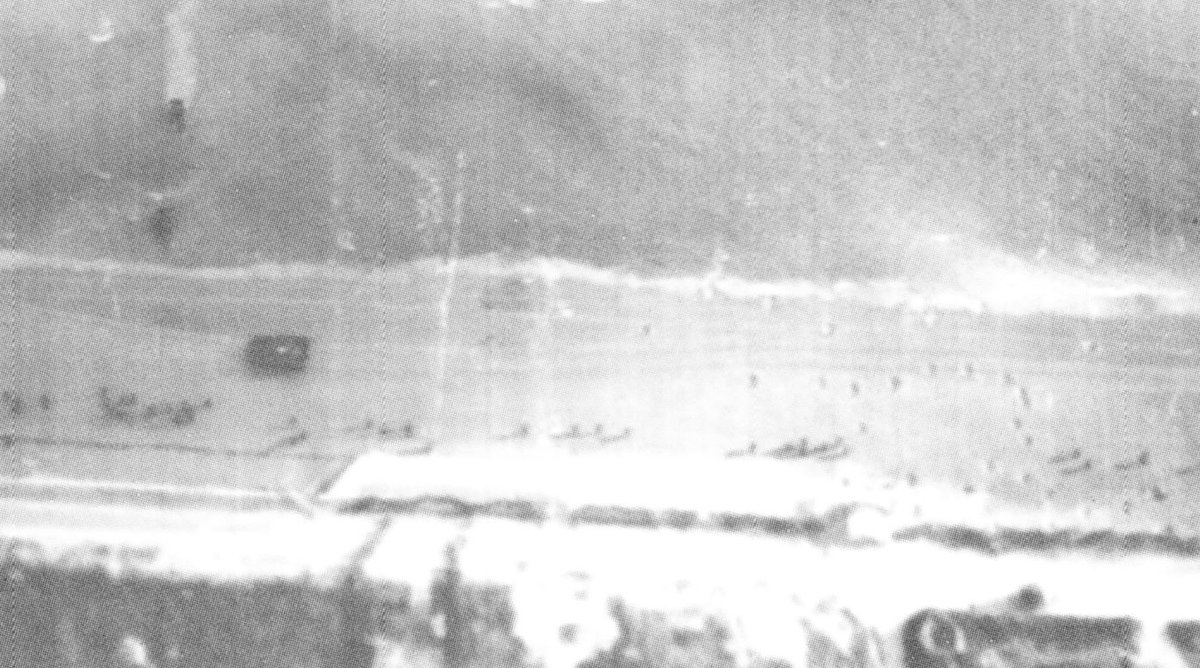 You can see a little of WN-35 in the bottom right, as well as a number of tiny craters on the beach. Codenamed 'Rug', WN 35 was the target of a number of destroyer, Landing Craft Gun and Flak, and Landing Craft Rocket. I think these craters *may* be from the latter.