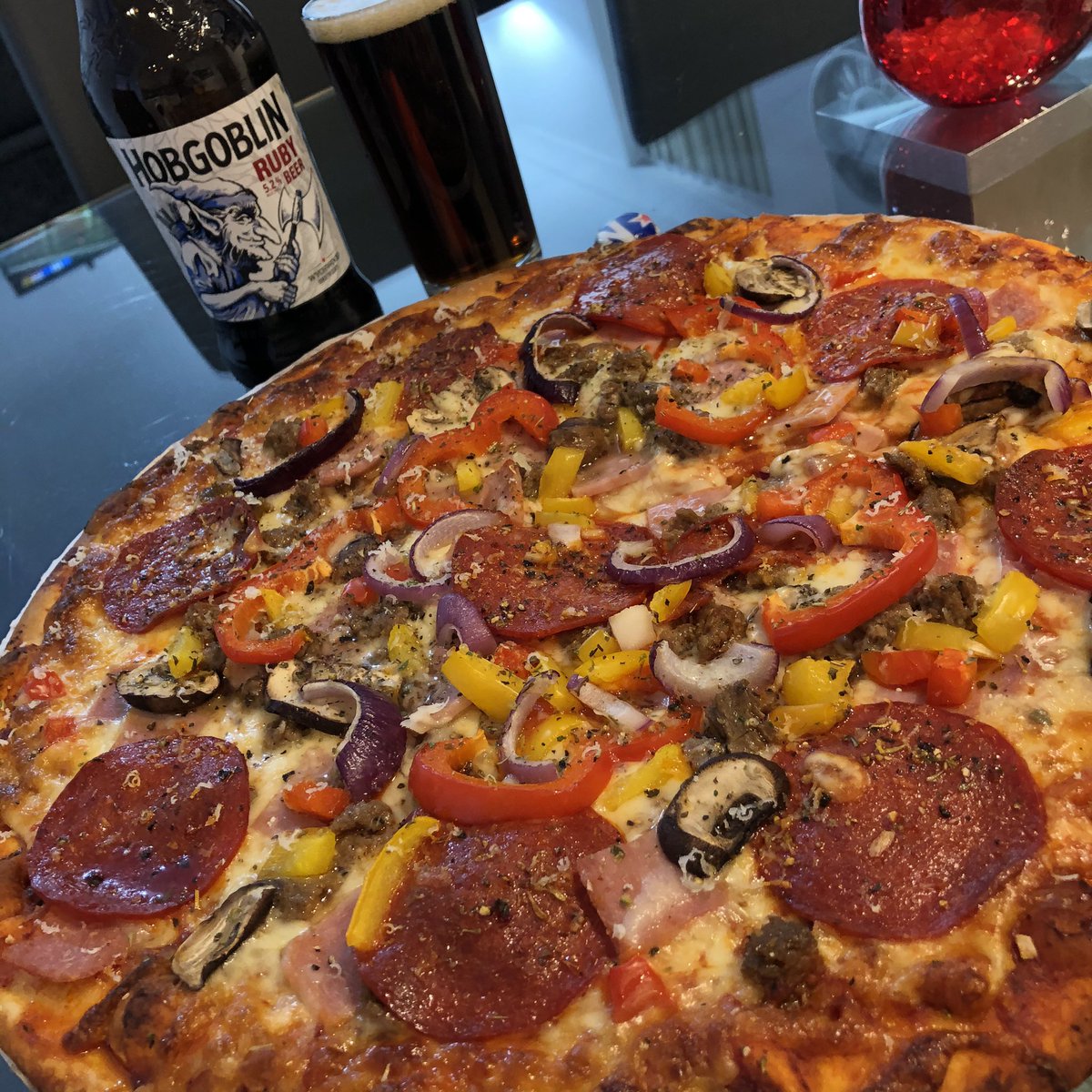 pauldawson36's tweet photo. A legendary Ruby @HobgoblinBeer to accompany a @Morrisons #mightymeaty #pizza that I’ve added too this #NationalPizzaDay 👍🏼😋🍕🍻 the perfect combination 😋🍕🍺👍🏼 https://t.co/m99lvit13n