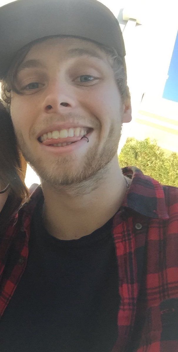 the most beautiful shade of blue represented by luke hemmings eyes; a thread