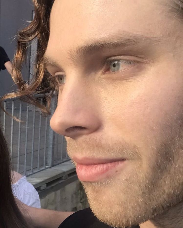 the most beautiful shade of blue represented by luke hemmings eyes; a thread