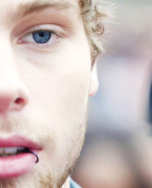 the most beautiful shade of blue represented by luke hemmings eyes; a thread