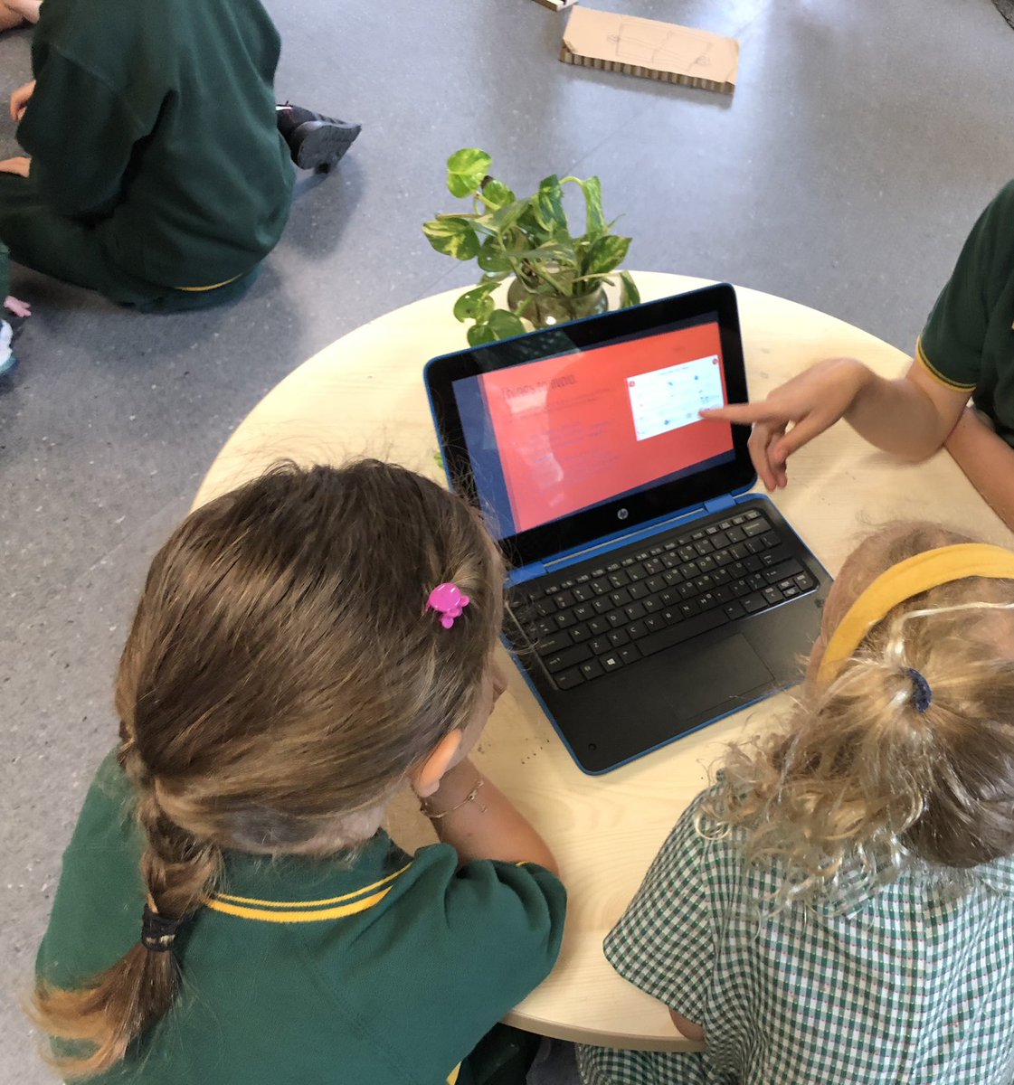 Our buddies teaching us about Lunar New Year! “During Lunar New Year you wear gold and red.” - SCW