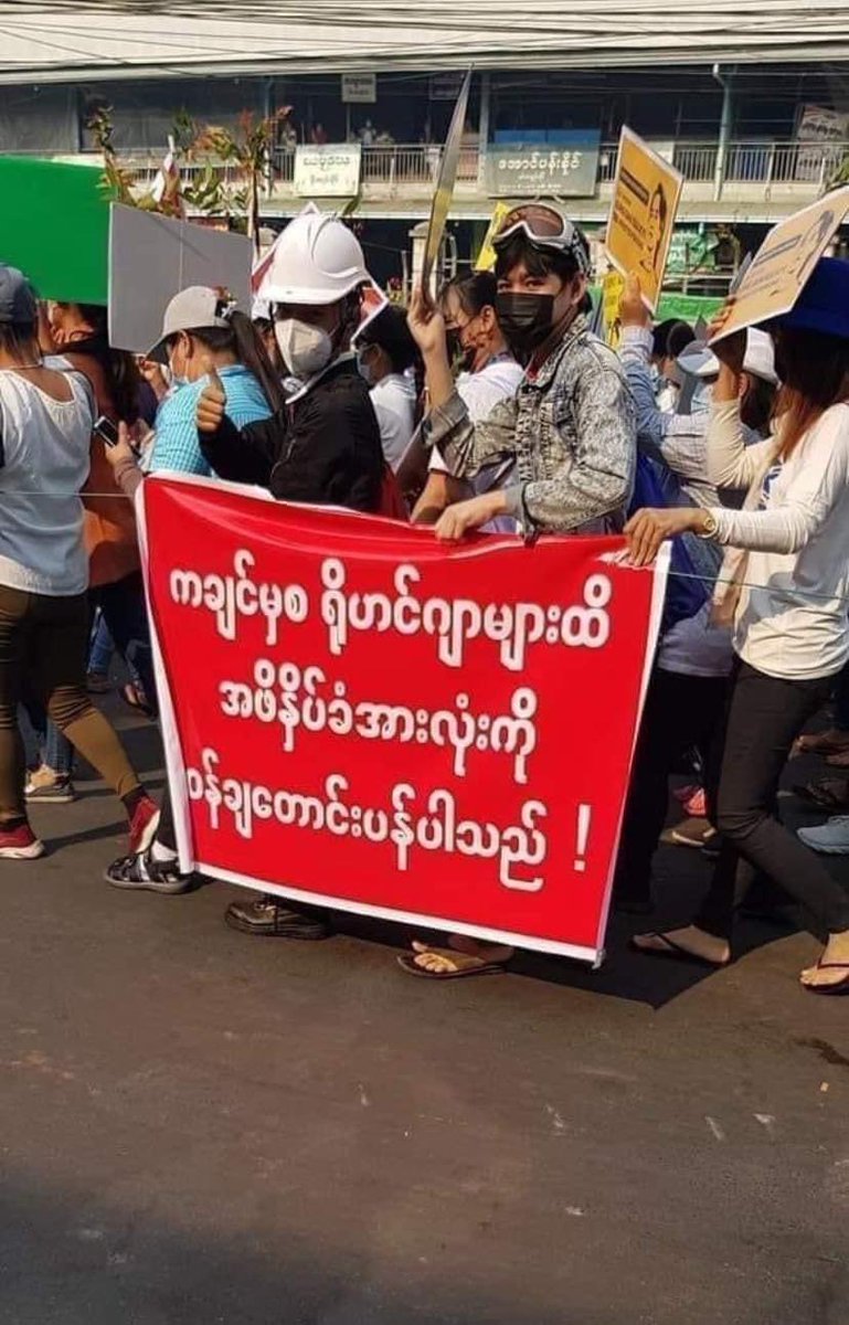 Protesters hold a poster mentioned “we deeply apologized all Kachin to Rohingya who are under oppression “ during protest in Myanmar. credit: Khin Zaw Myint Facebook post. #WhatsHappeningInMyanmar