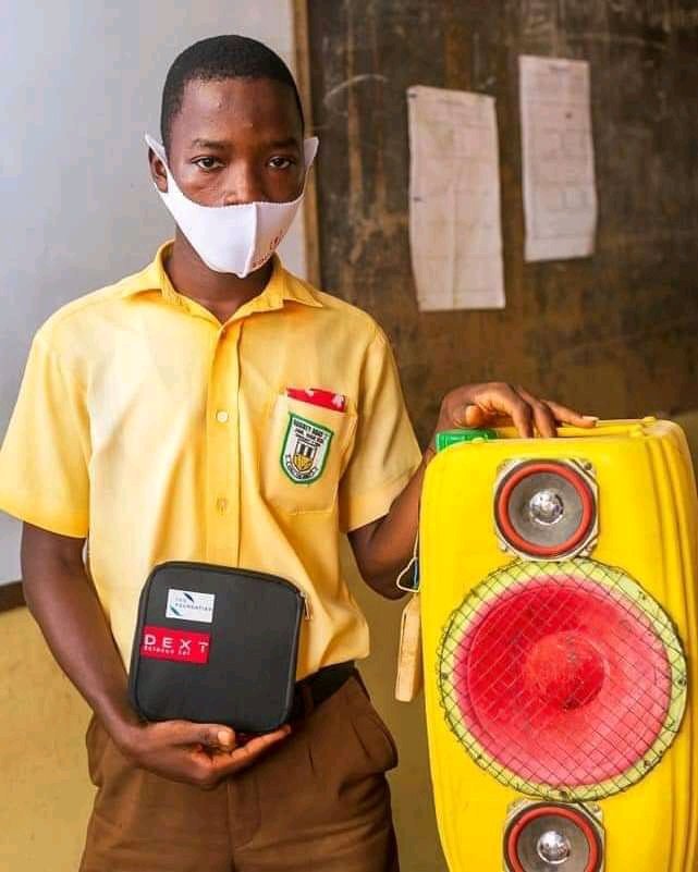 student uses gallon to create a sound system