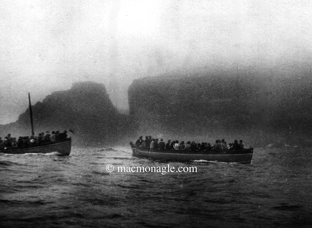 MACMONAGLE's tweet photo. #Skellig Rocks boat trip in 1940's. 7 boats carrying up 50 people in each boat with no life jackets over choppy seas 7 miles to #Skelligrocks Mass celebrated here since 16th century Our founding father Daniel MacMonagle photographed these pilgrims #capturinghistory @PPAI_IRL https://t.co/o6PeZ6caUC