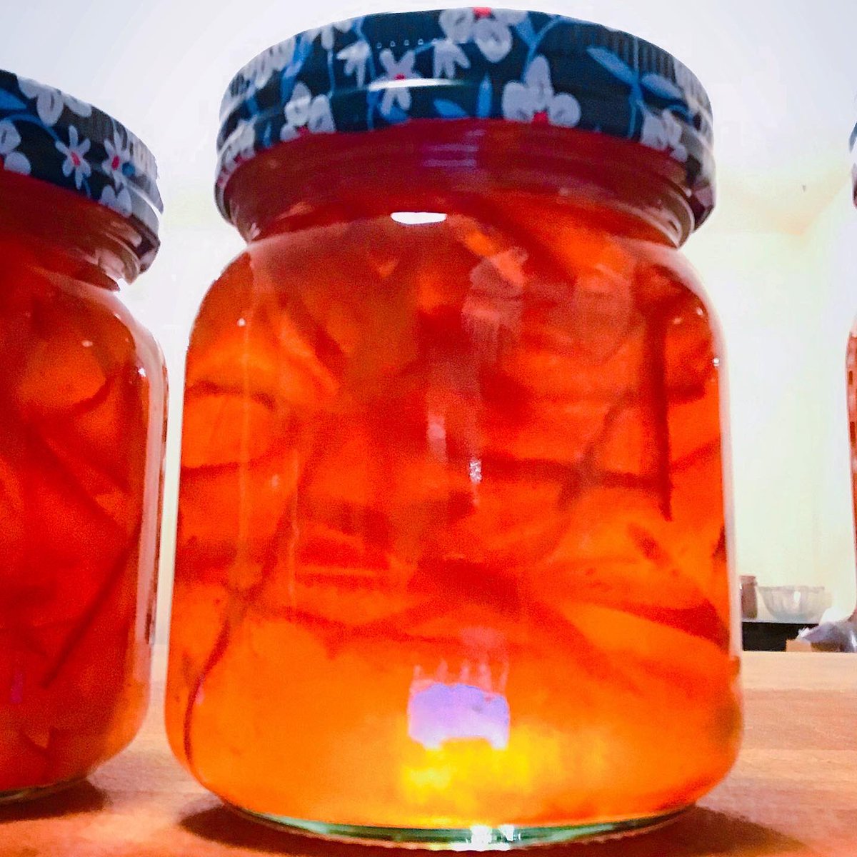 Setting sun, a glorious deep orange. Took it to 105.5 this time. Let’s see. Really very happy making. Looking forward to toast tomorrow. Lovely jars courtesy of <a href="/FollainJams/">Folláin Preserves</a> #cleanresuseandgoagain