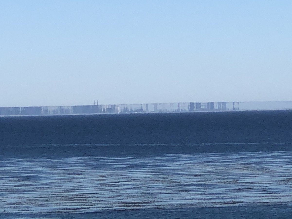KSBWGina's tweet photo. Did any one see this in Santa Cruz? My uncle couldn’t believe it! He took multiple shots from East Cliff of what appeared to be a wall across the Monterey Bay.                                             Must’ve been some sort of mirage. https://t.co/r2ad3GARPK