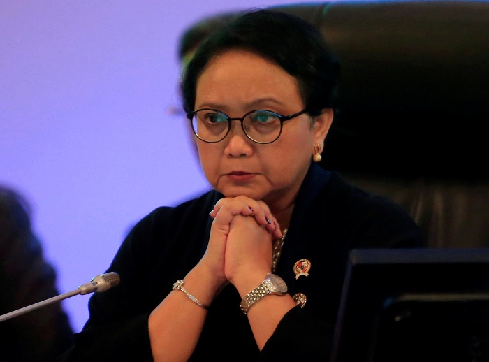 Indonesia's foreign minister <a href="/Menlu_RI/">Menteri Luar Negeri Republik Indonesia</a> said Myanmar's democratic transition should follow its people's wishes, but the ministry declined comment on whether last year's election must still be respected after the coup reut.rs/3pK0VVk #WhatsHappeningInMyanmar by <a href="/tom_allard/">Tom Allard</a>