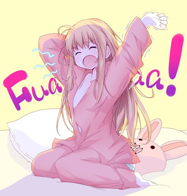 寝起きにあくびしてる女の子。 