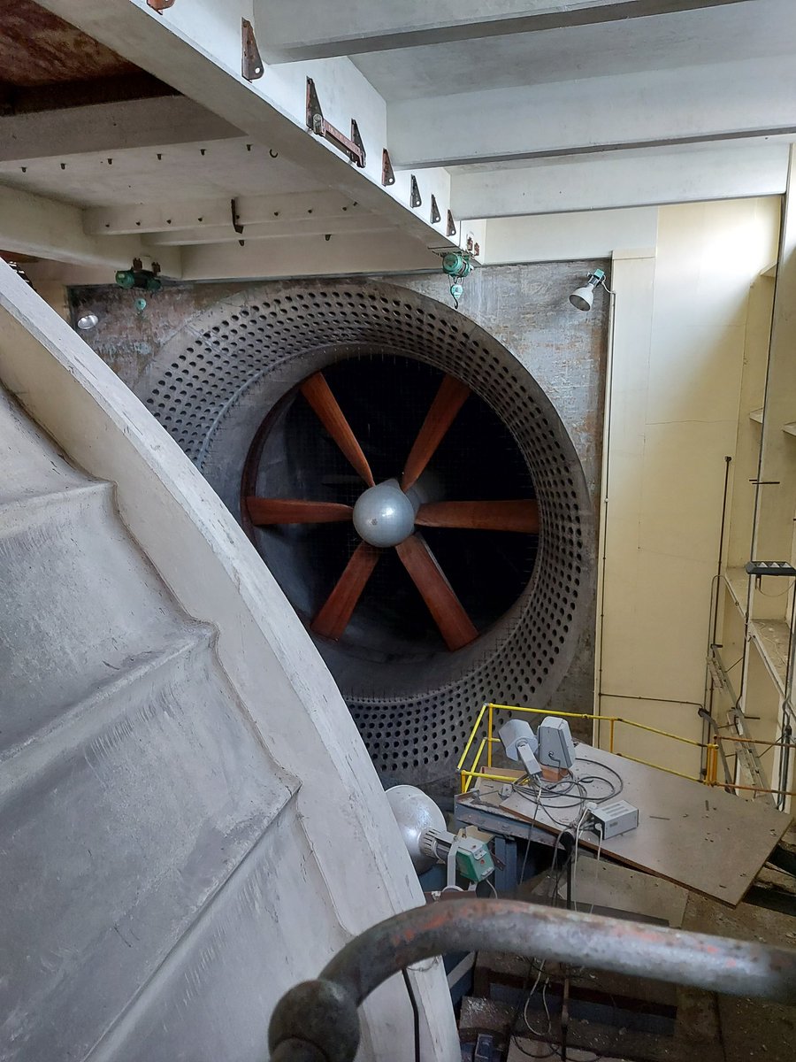 TimeAssured's tweet image. The sun&apos;s back out while Mike installs some new opal glass, the clock over looks Britain&apos;s oldest wind tunnels building that has tested everything from Spitfires to Concorde&apos;s.