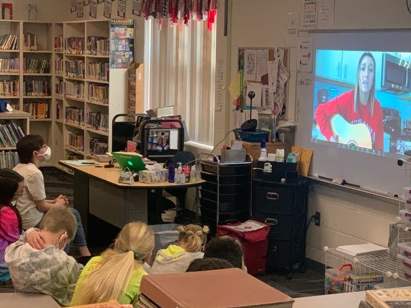 BC_Cardinals's tweet photo. We want to thank Morgan Pieri, a former UNL track athlete, for speaking with 4th &amp; 5th grade students about being an athlete and a musician.  Morgan also talked about the importance of following your dreams and trying lots of different things.  #bcesrocks  #followyourdreams https://t.co/q7trnU4OkS