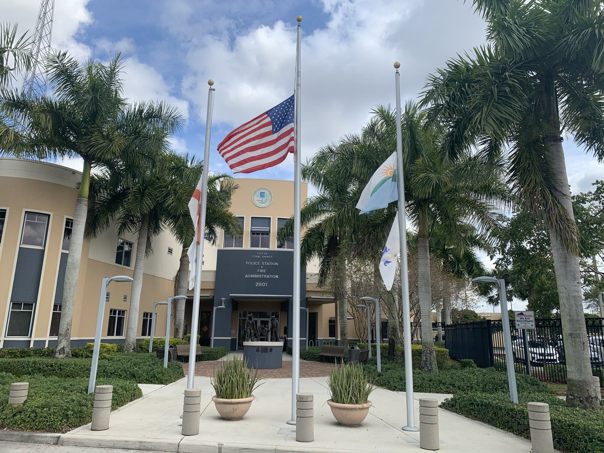 CoralSpringsPD's tweet photo. By order of the President of the United States, all flags at Coral Springs facilities will be flown at half staff now through February 26, 2021, to honor the 500,000 lives lost as a result of the COVID-19 virus across our Nation. https://t.co/jIqga2xTmc