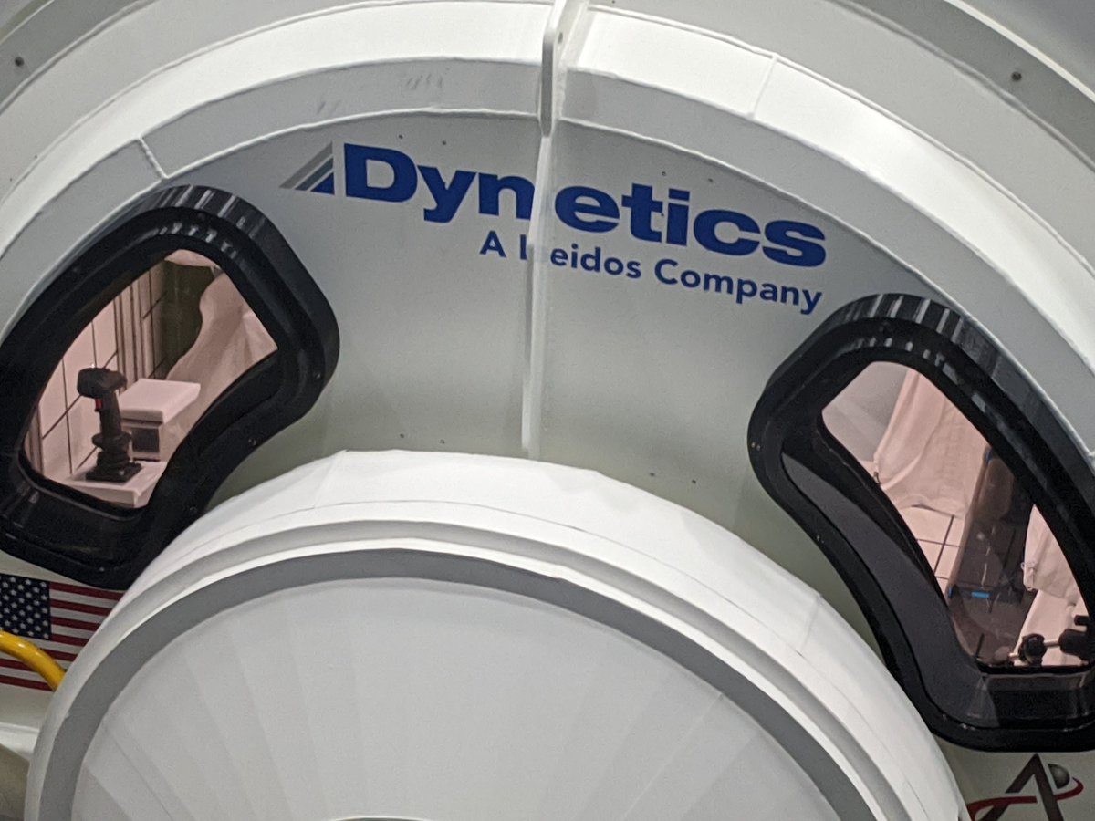 LuaRhonald's tweet photo. It is nice to see a sidestick controller (joystick) and white tilings thru the windows(eyes) of the @Dynetics #DyneticsHLS ALPACA @NASA_Johnson, while National Team #HLS is at the back. @SpaceCenterHou https://t.co/kx5Mv1T8Ja