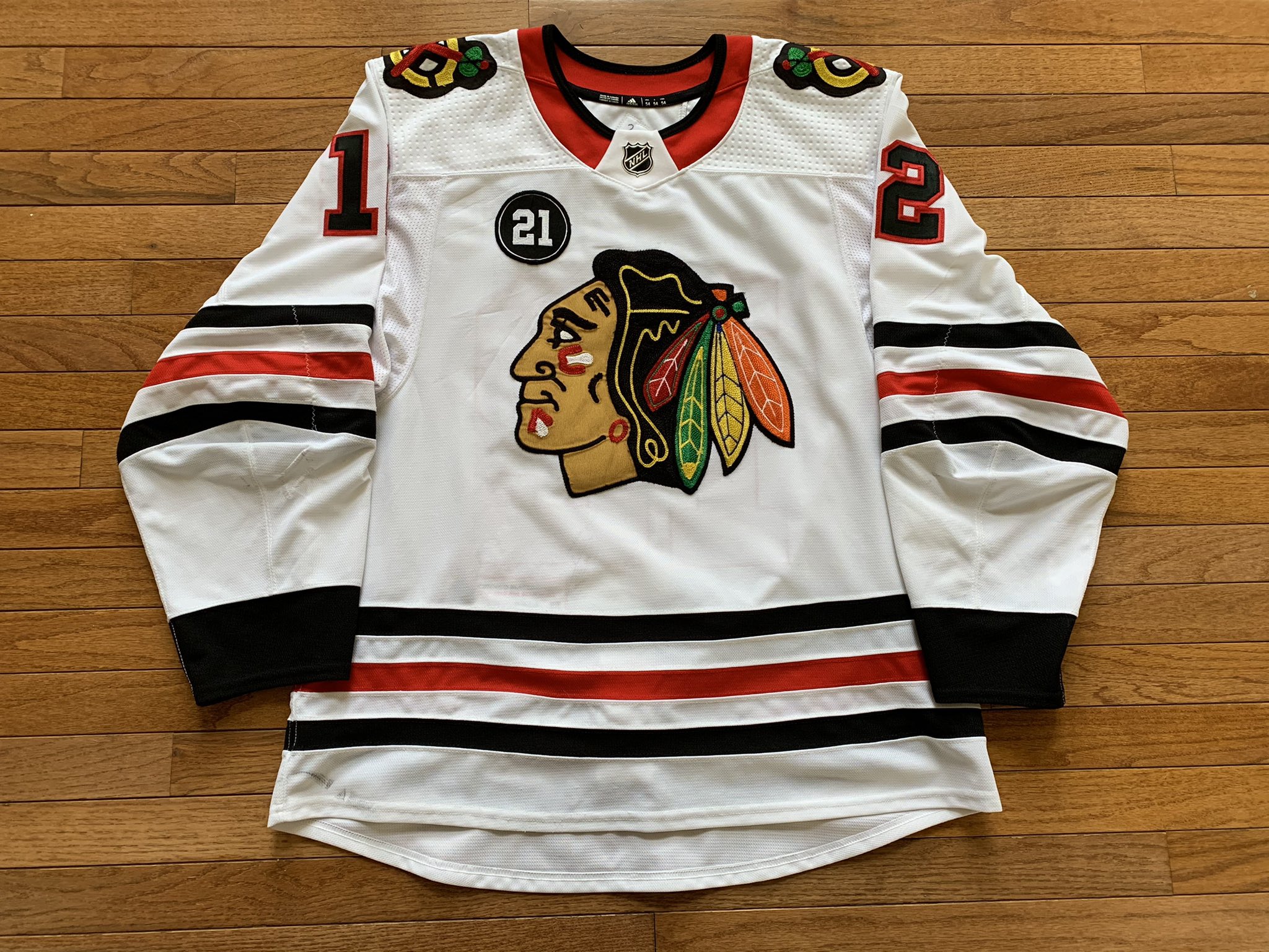 ALEX DEBRINCAT SIGNED CHICAGO BLACKHAWKS WHITE REEBOK JERSEY KDS WITNESS