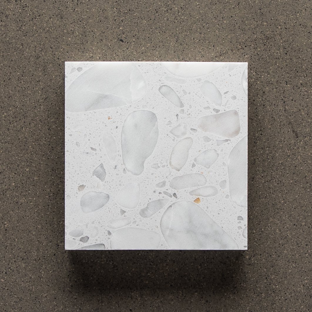 We just love seeing the detail of the individual marble chips in this white and grey technical stone tile. The design &amp; colour combinations are timeless and the application possibilities endless.

Background tile: Regal - Ash Matt
Technical Stone Marble - 8072

#terrazzotuesday