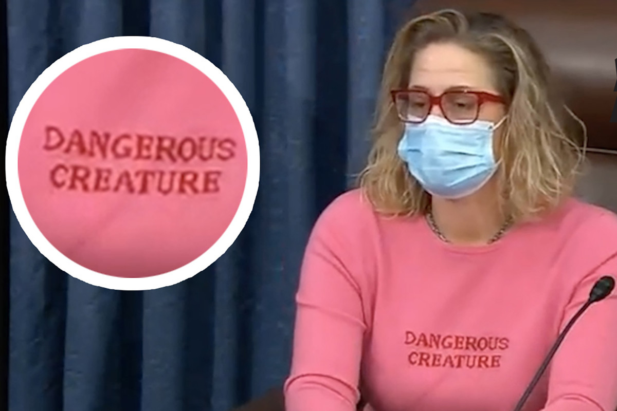 Sen. Kyrsten Sinema causes stir presiding in hot pink 'Dangerous Creature' shirt