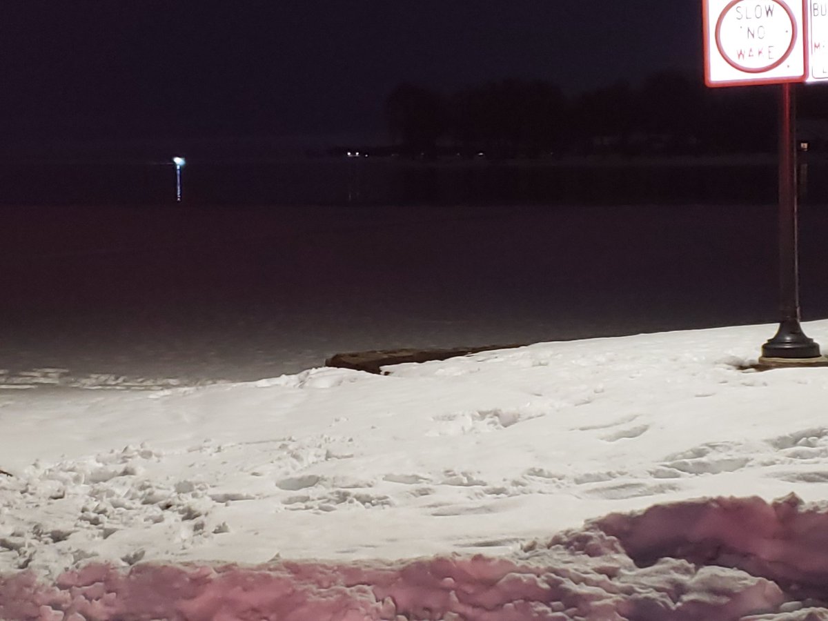 NMFireRescue's tweet photo. NMFR crews with a shorebased  water rescue crew and Boat 32 assisting, rescued a single snowmobiler that broke through the ice near the mouth of the Fox River in Menasha around 6 tonight. https://t.co/ME63AHV2Qi