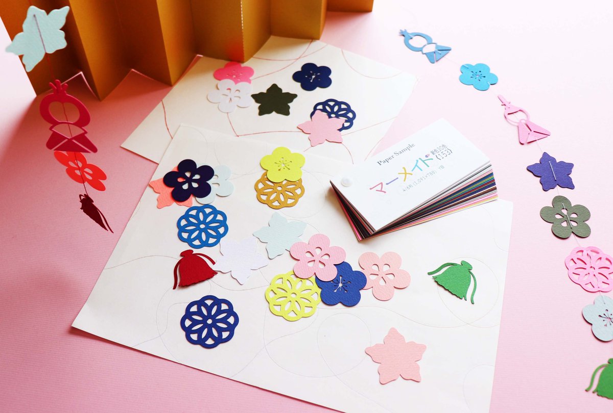 株式会社ミューズ １年半前にリニューアルしたマーメイド紙 可愛い色達なのでつるし雛を作ってみたよ 切り取ったマーメイドを針と糸で通しただけ