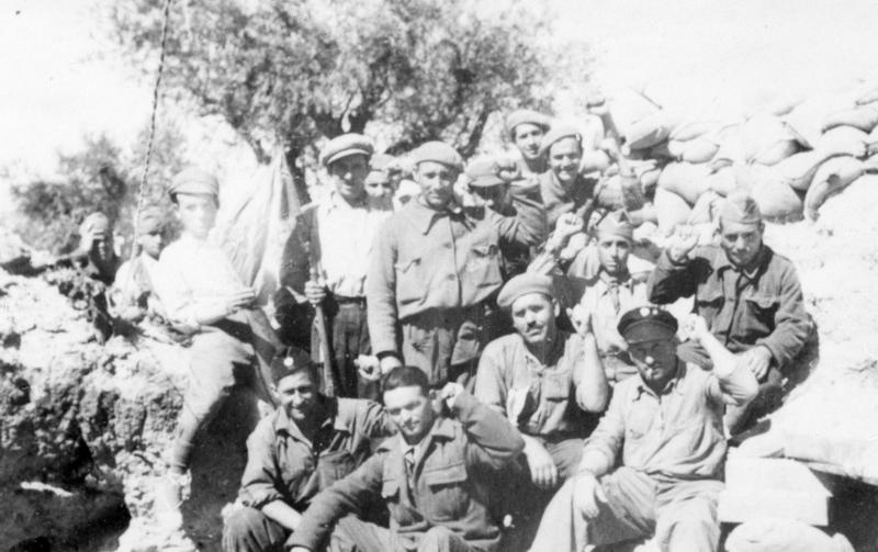 Colonel Asensio Cabinalla is in command of the Fascist forces. Silhouetted against the skyline, the British and Irish Brigaders are easy targets for the Nazi German heavy machine guns supporting the Fascist advance. On the western slopes, several men are hit by the raking fire 5/