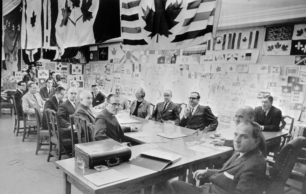 Liberal MP John Matheson led the multi-party parliamentary committee to select a new flag design for Canada. He had previously served with 1st Field Regiment, Royal Canadian Horse Artillery in Italy, and was grievously wounded at Ortona. 2/ Cliff Buckman /  @LibraryArchives