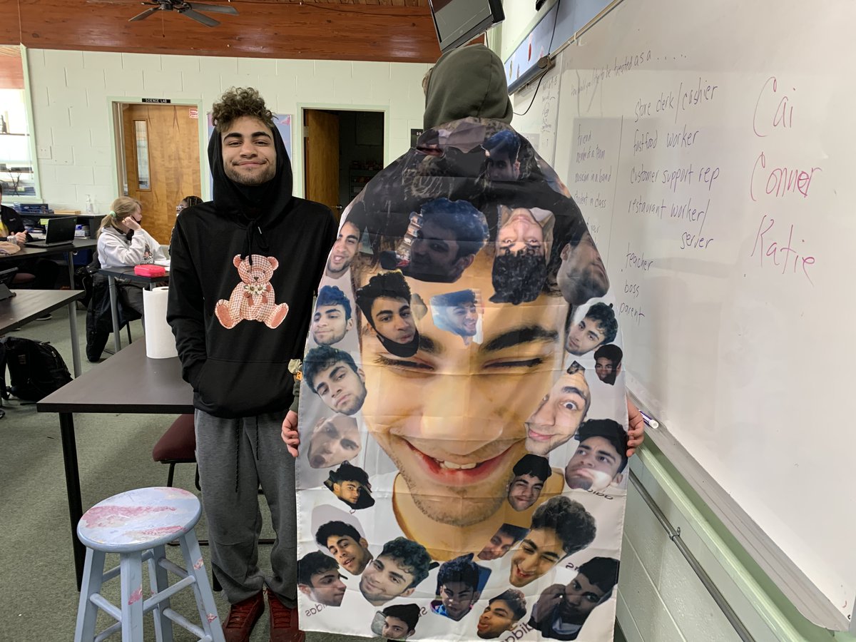 kcwrightson's tweet photo. These two seniors from my high school have a bromance that required them to create special capes made from pictures of all their fun times.  Here, Vince models his cape of Alex.  .  .    #lovemystudents https://t.co/0VAhFRvhSd