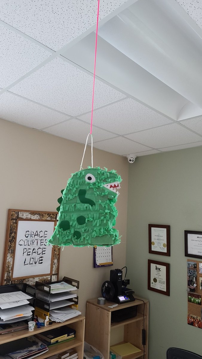 Yolodisorder's tweet image. Come into my classroom this morning and there is a Dinosaur Piñata hanging above my desk! Wonder whats in it? #teachersoftwitter #covidteaching