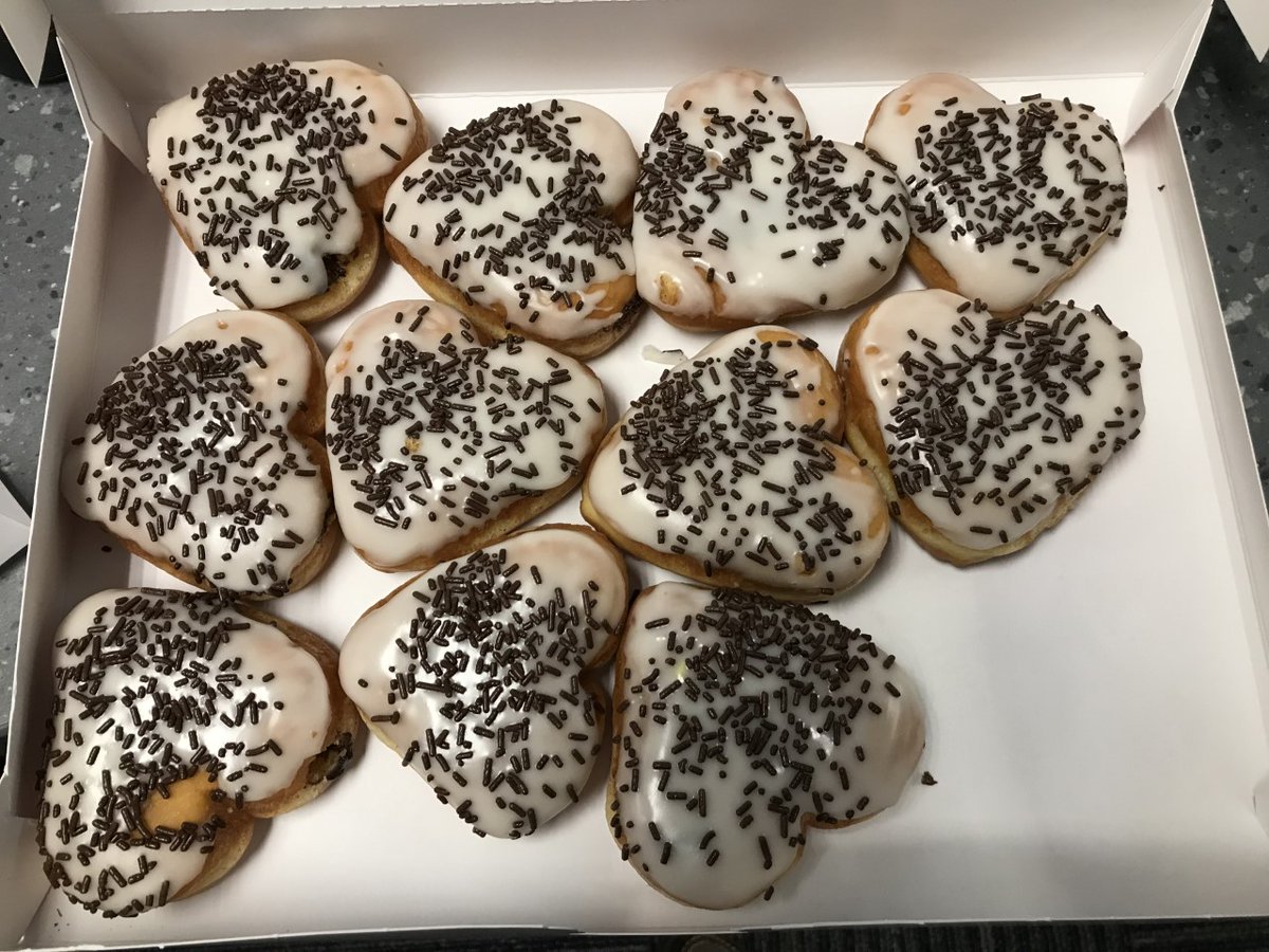 JohnPattiWBAL's tweet photo. The Ravens and Dunkin' will travel to three Medstar hospitals in the Baltimore area today to deliver 30 dozen of heart-shaped donuts, like these, alongside freshly brewed coffee to healthcare workers. Happy Valentine's Day! https://t.co/vvGBRPjaKP