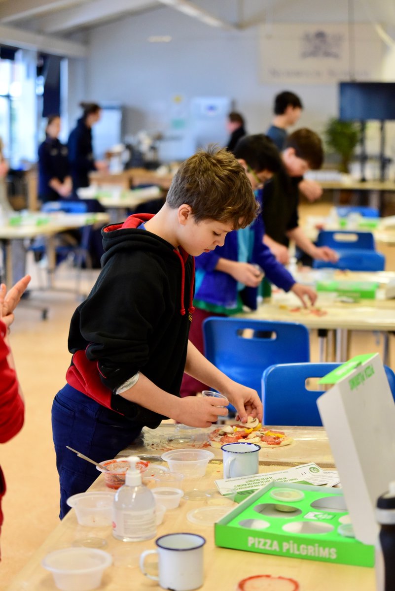 NorwichSchool's tweet photo. Our key worker children have been busy making their own lunch today! With the help from @ChartwellsInd Chef Tom and @pizzapilgrims the pupils made their own pizzas! #PizzaInThePost https://t.co/LTOlEqNjqn