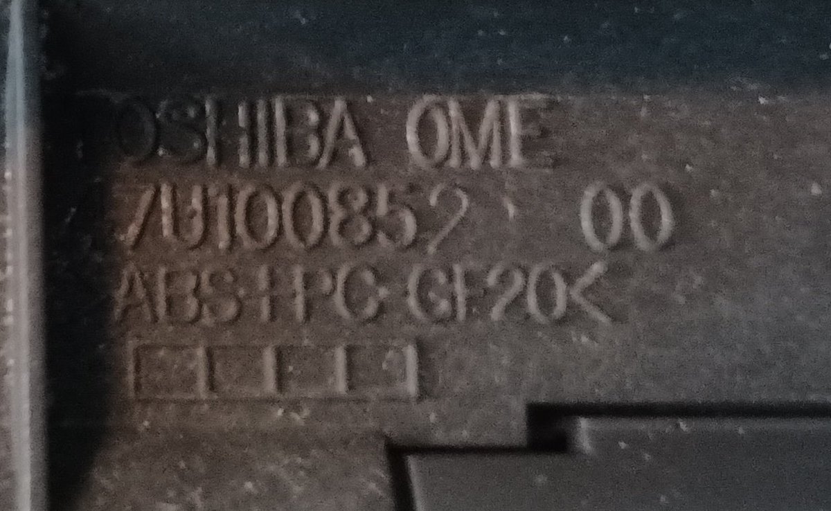 Under the battery there's some numbers molded into the plastic.Toshiba OME 47U100852this may shock you... but there are no results on google for this.