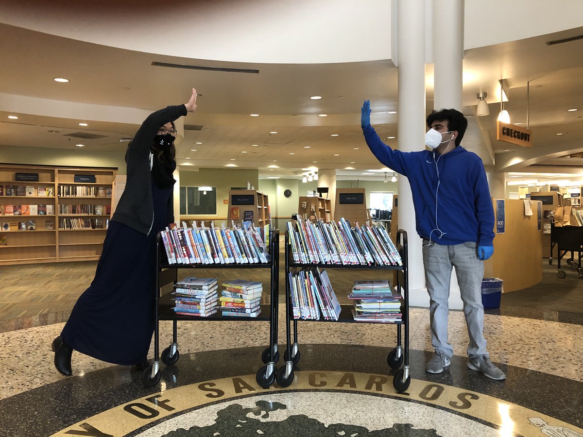 SMCLibraries's tweet photo. ๐ It turns out book carts are a great way to remind ourselves to keep six feet apart. Let's give our staff a social-distanced high five for all their hard work in the libraries to get your books to you! #MaskUpSMC #SMCLibraries https://t.co/s0cJPl1xRL
