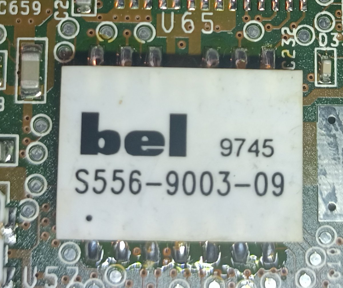 This oddly packed bel S556-9003-09 is a PCMCIA ethernet chip