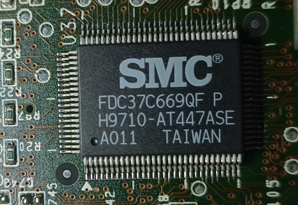 There's an SMC FDC37C669QF.This is a super-io controller, doing floppy drives, serial ports, parallel ports, game ports, and IrDA.