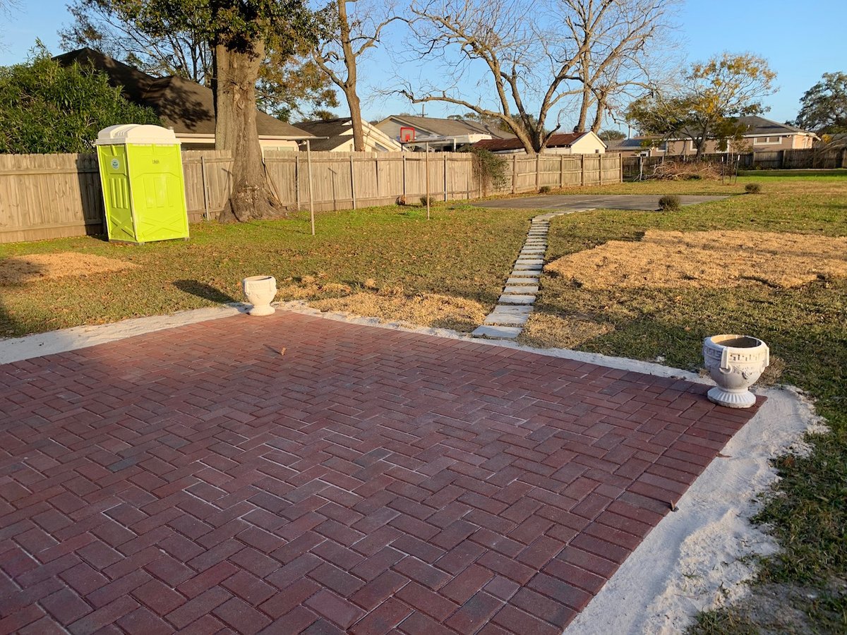 NORArevitalizes's tweet photo. It's another rainy day in NOLA, but this #CommunityAdaptationProgram homeowner is ready. This installation promotes absorption and storage of rainfall through interconnected infiltration trenches and permeable paver systems that hold 2,292 gallons of water every time it rains. https://t.co/cBQesyx372