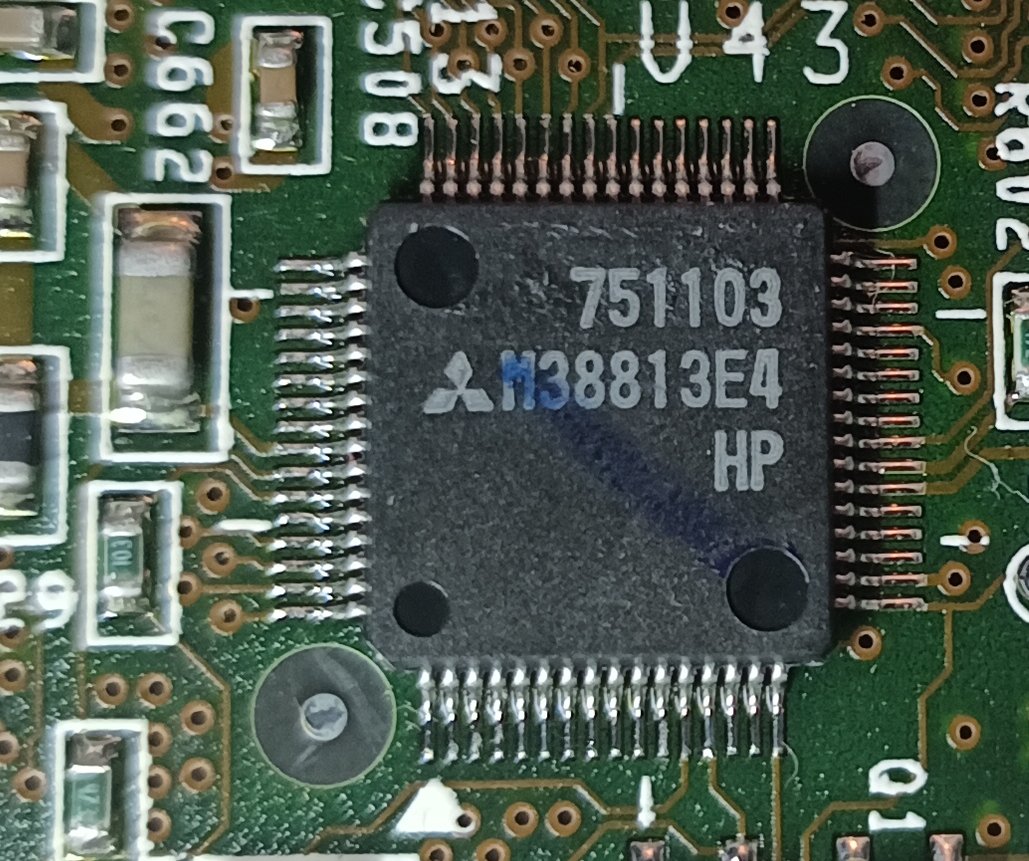 The other chip I had to de-label is this, a Mitsubishi M38813E4.This is apparently ANOTHER 8-bit microcontroller.