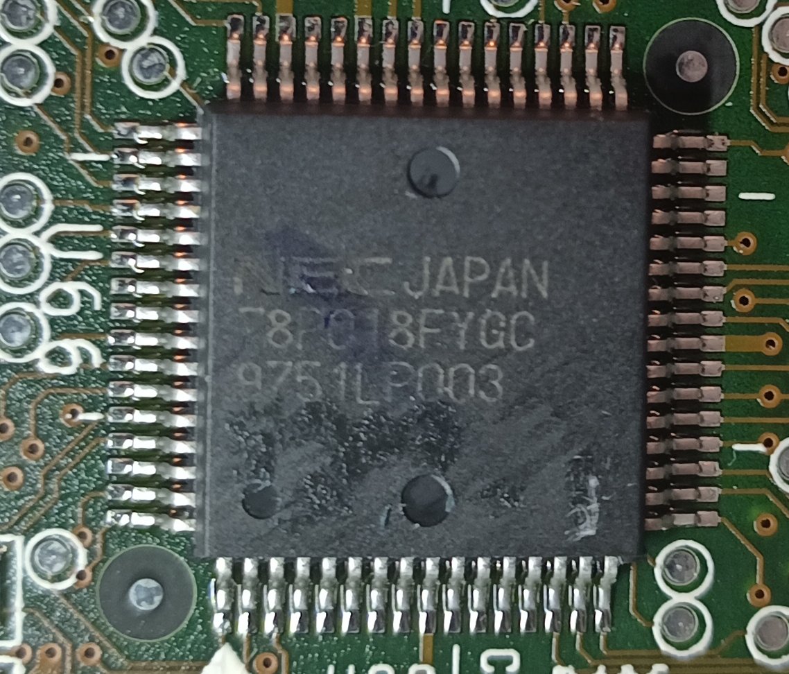This chip is an NEC µ PD178P018FYGC.It's an 8-bit microcontroller with built in EEPROM or mask rom. This same chip is on some Toshiba Satellite boards, so it's apparently a commonly used helper chip for Toshiba.