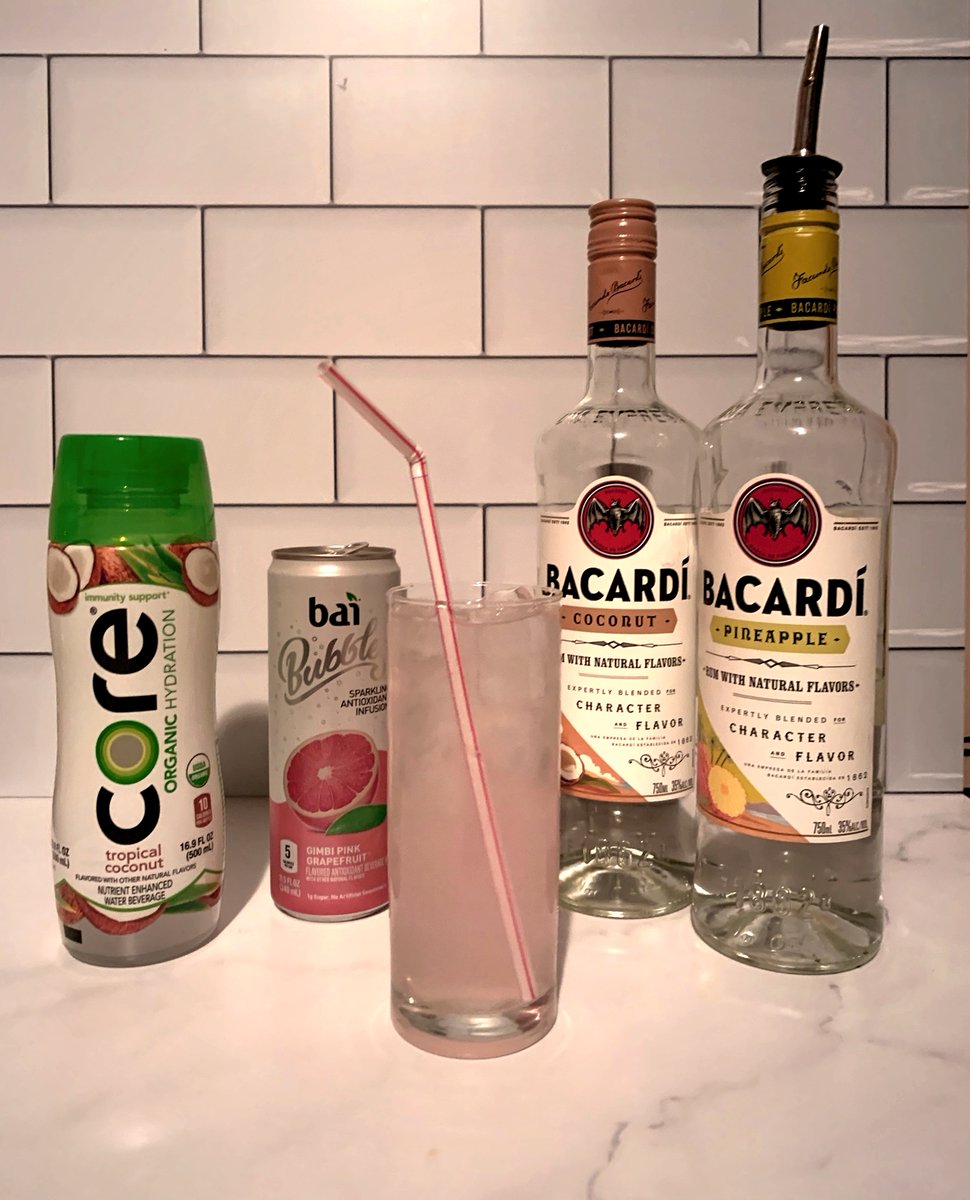 Soft and tropical, As the universe intended. This week's drink of the week is:

Pretty in Pink
1oz of Bacardi Pineapple
1oz of Bacardi coconut
Core Tropical Coconut Water 
Bai Bubbles Gimbi Pink Grapefruit