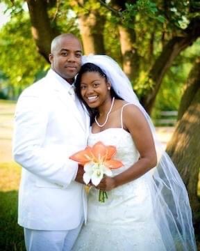 A bride and groom in formal wedding attire