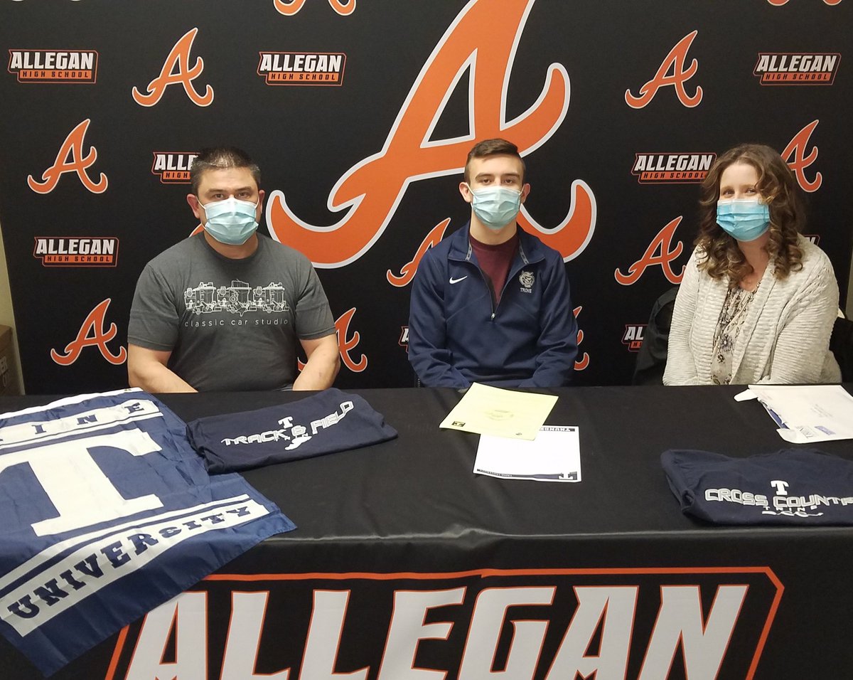 Congrats to Blane Johnson and his family as Blane signs his letter to continue his Academic and Athletic career at Trine University. Blane will run Track and Cross Country. Go Tigers
