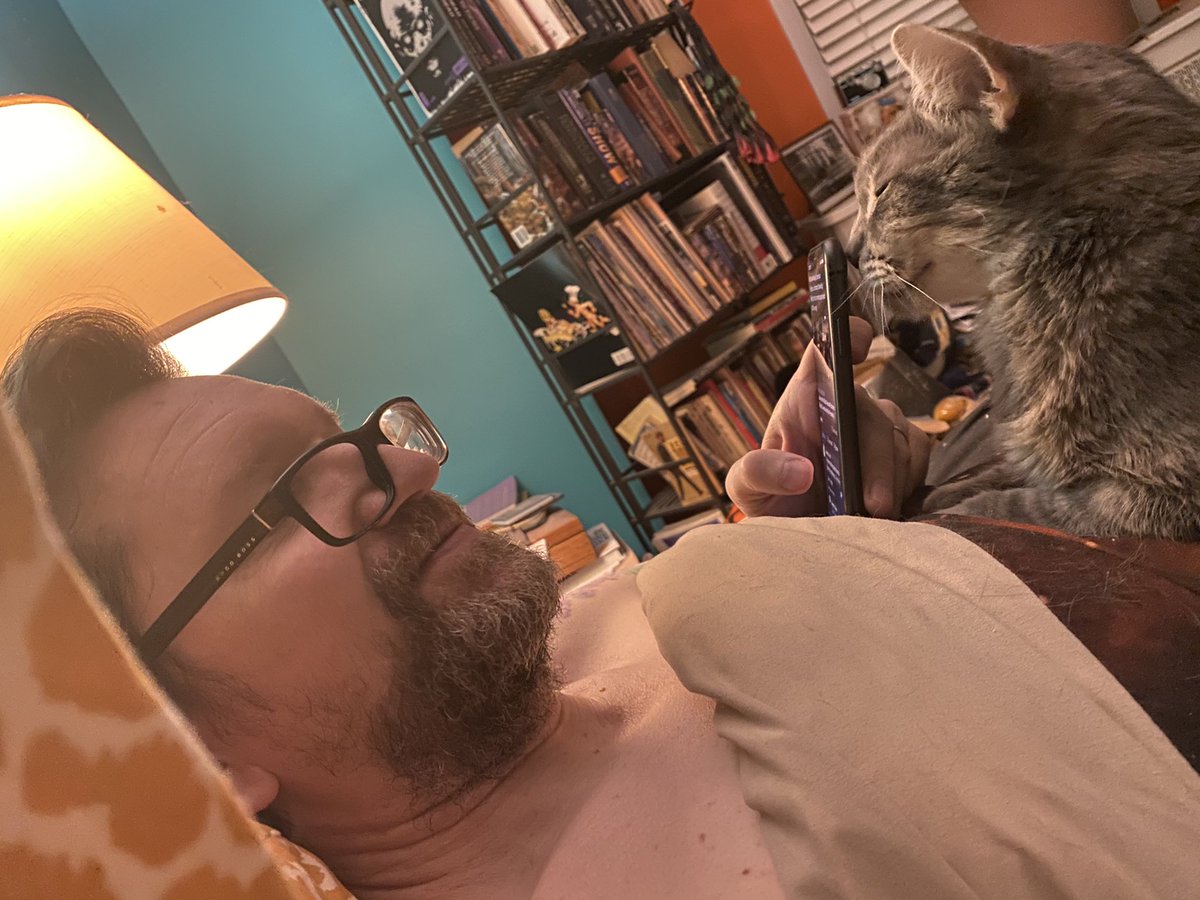 Okay here is my husborz with three of our kittorz.