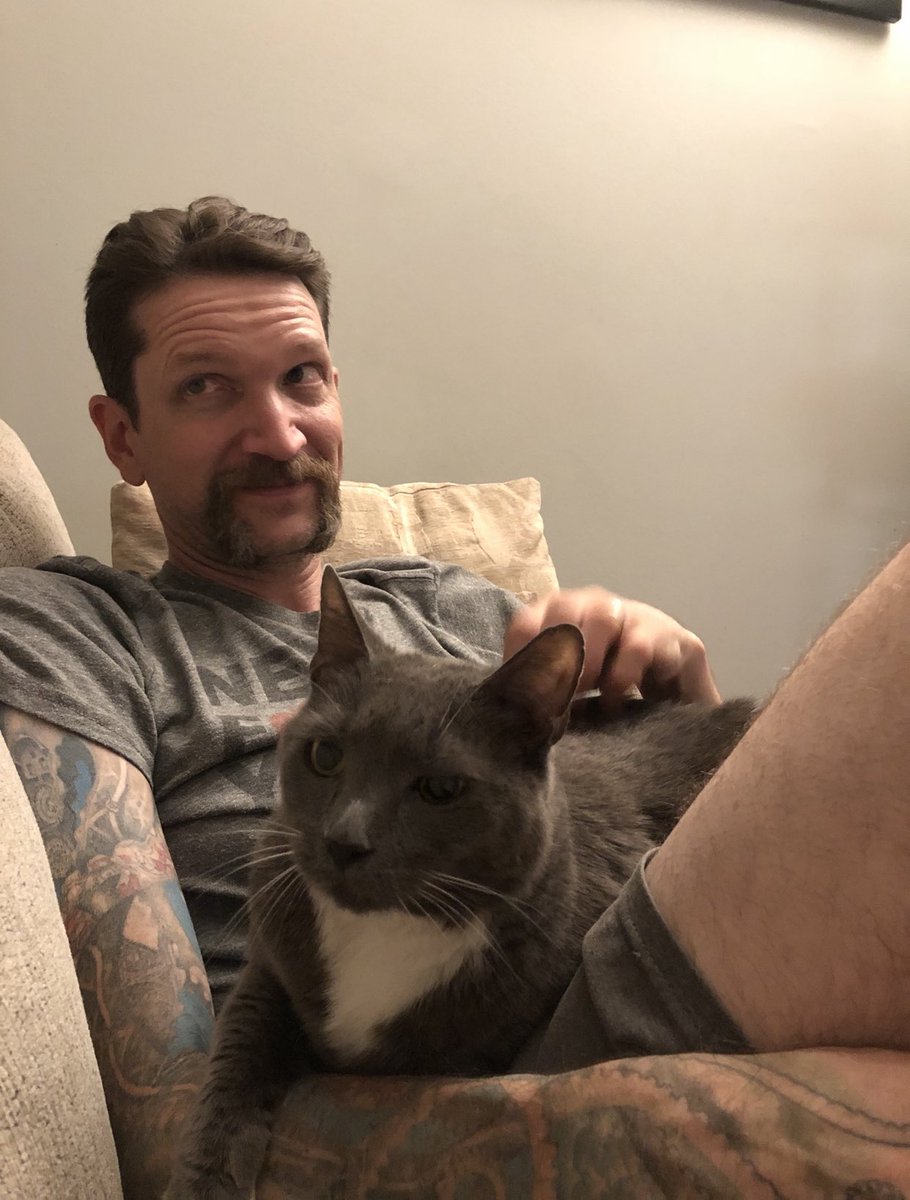 Okay here is my husborz with three of our kittorz.