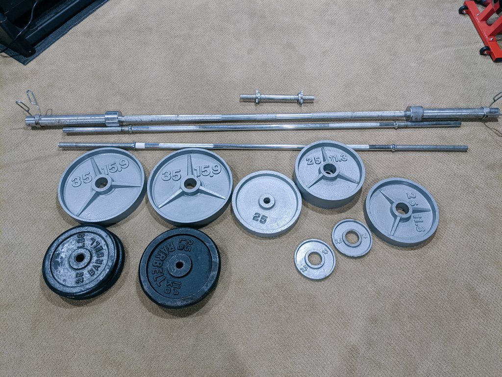 RGriffithDPT's tweet photo. Look what we found in the crawlspace and polished up a bit!

350 lbs of metal and fun. 🏋️‍♀️

#2021derful #homegymexpansion #foundtreasure https://t.co/ojXsGg2K0b