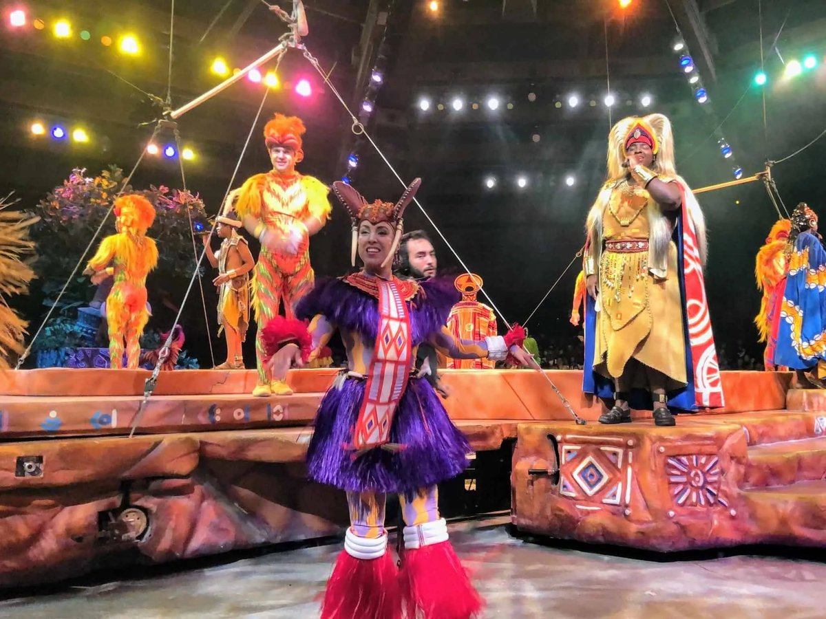 From beginnings, to becoming one of the longest running WDW shows (23 years and counting), FOLK is a well written, staged, and a fun musical show based on the Lion King. From its choreography to live singers, and acrobats, it’s truly one of the greatest Disney shows of all time.