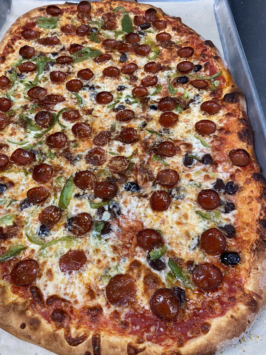 Large pizza in house feeds 4-5 people comfortably!  This one was gone before we knew it! #pizzalover