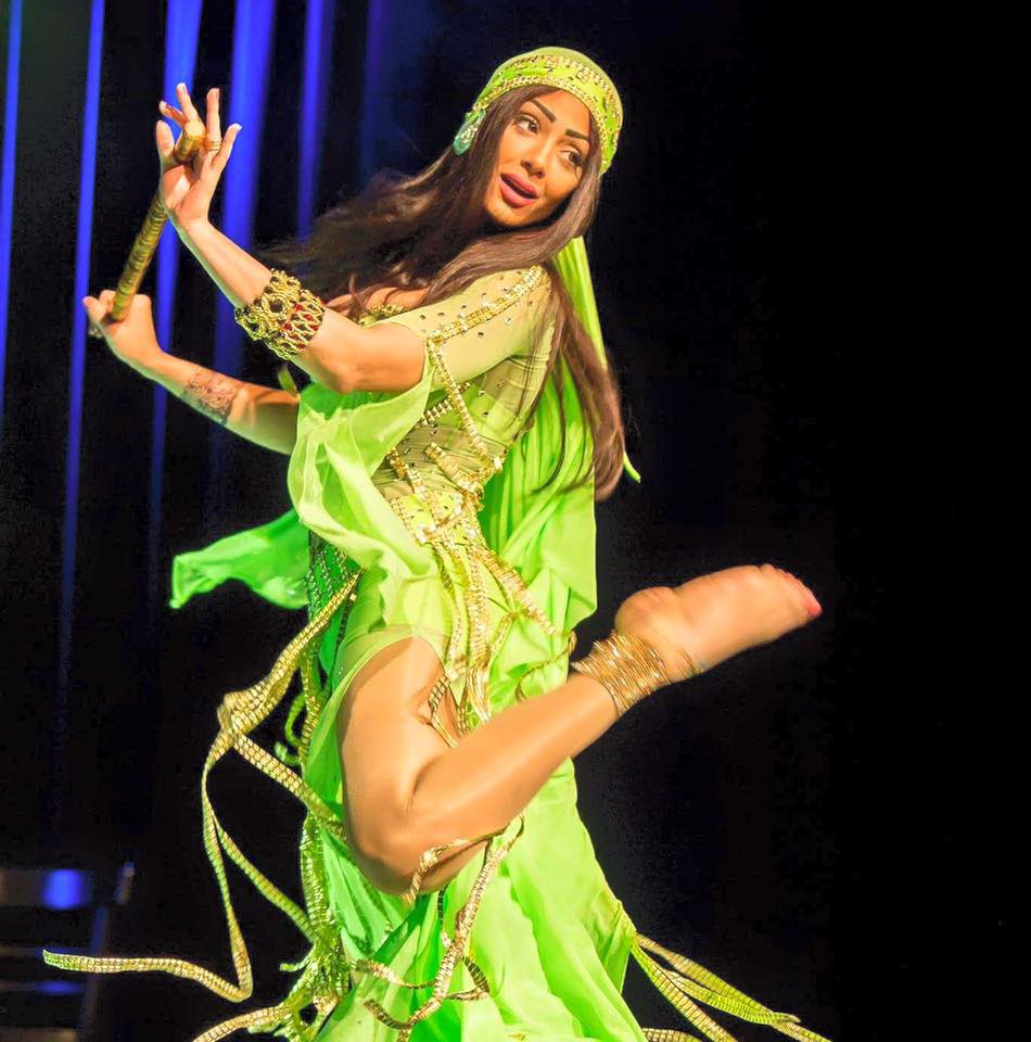Women performing the dance (raqs el assaya) is more delicate and flirtatious. And the stick used is bit smaller. Their outfits can consist of a feminized galabiya or Assuit clothing, some sort of bedazzling costume with the stick is what’s needed.