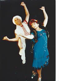 Iskandrani Dance involves man and a woman usually dressed in a sailor costume while the woman dressed in the traditional malaya leff and a shawl. The shawl is used to wrap the female around and as an extension to be flirtatious to the male dance.