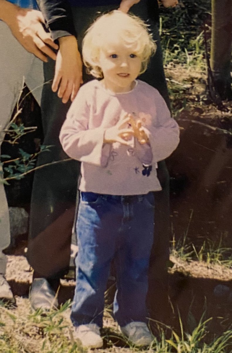 Here’s a photo of me when I was around 2 years old, stimming with my hands. I still stim with my hands.